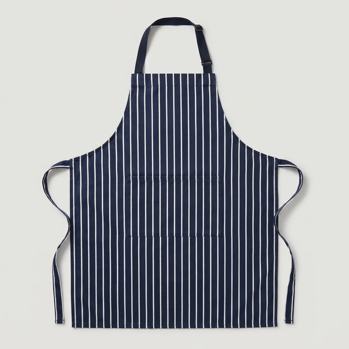 Navy and white butcher-stripe bib apron with single front pocket