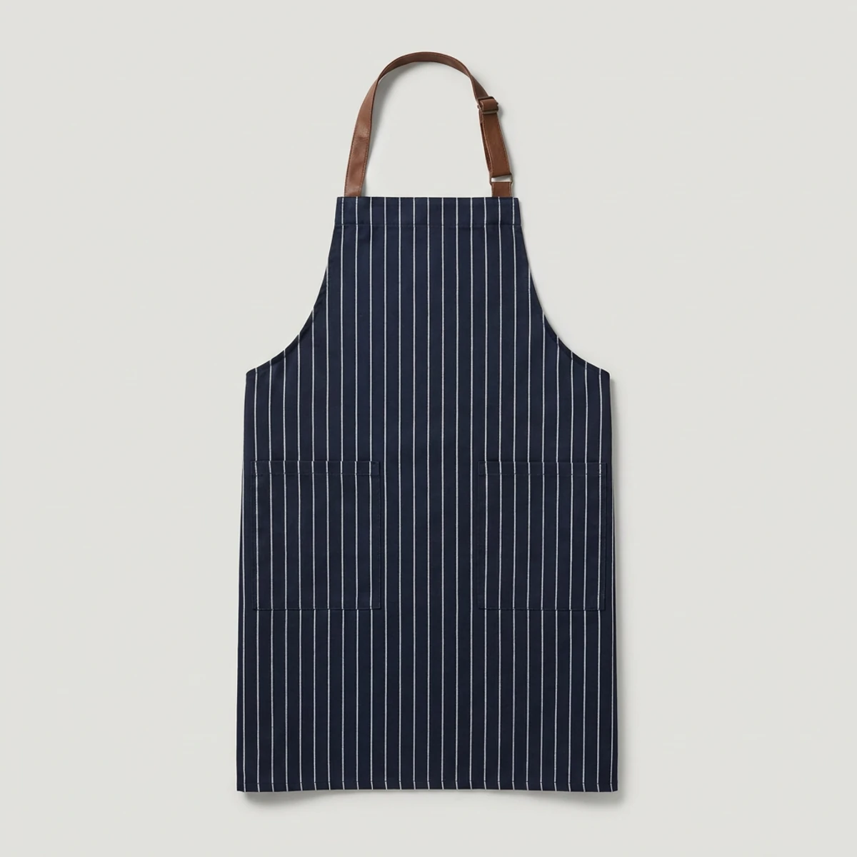 Navy pinstripe kitchen bib apron with leather-look neck strap