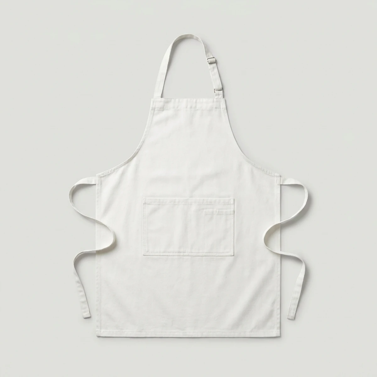 White kitchen bib apron with adjustable neck strap and center pocket