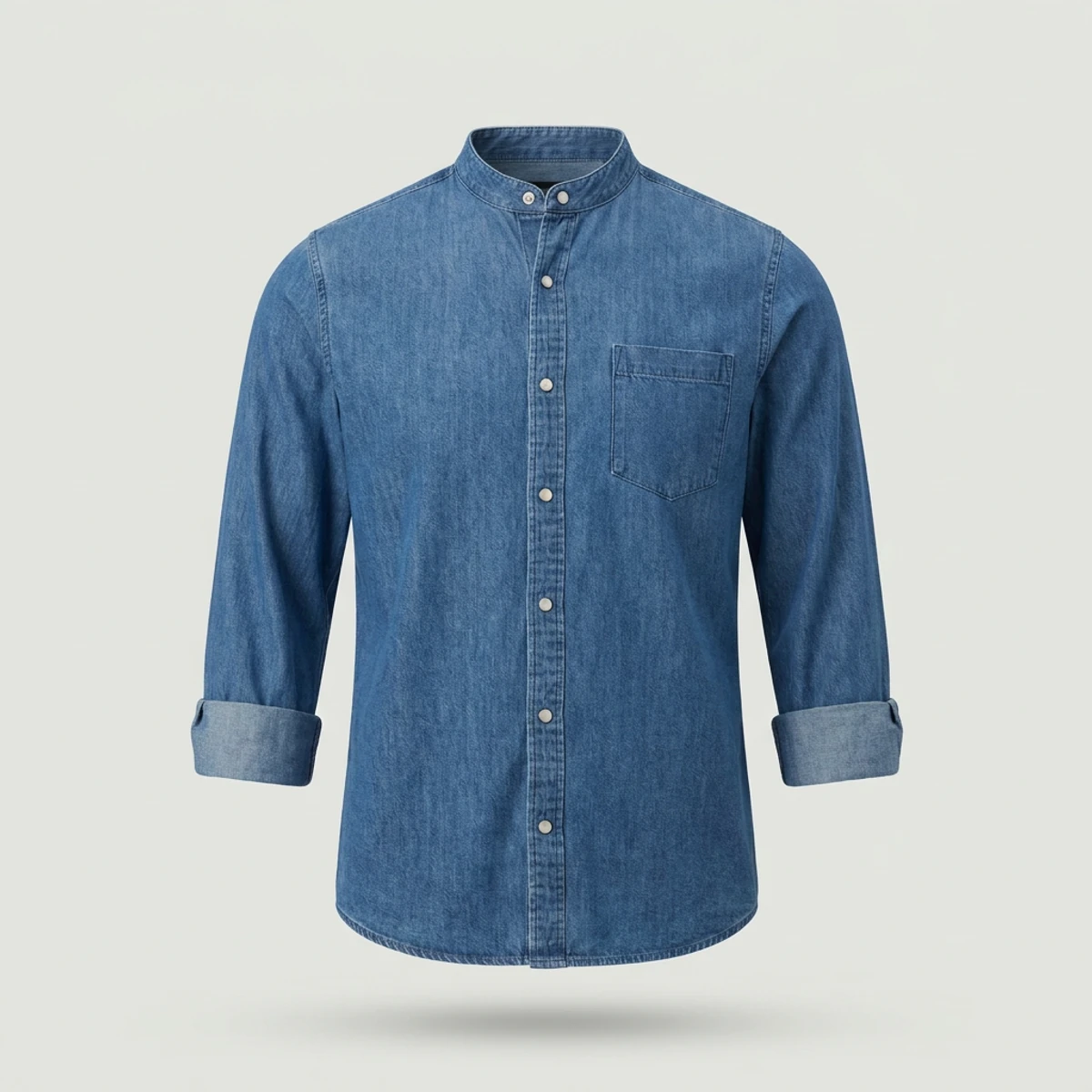 Mid-blue lightweight denim chef shirt with snap front and rolled sleeves