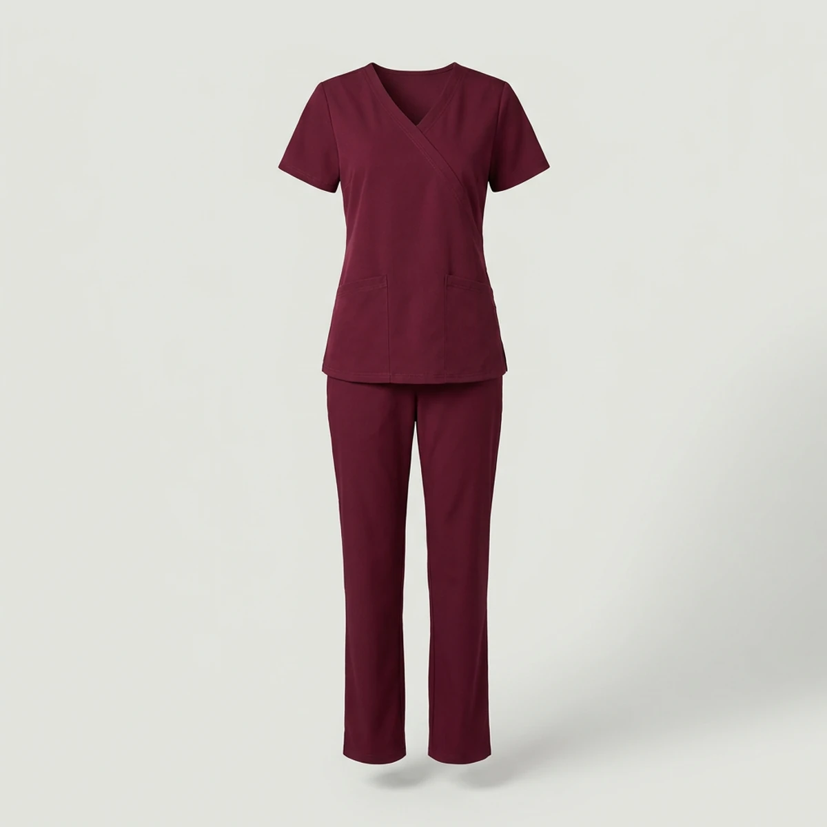 Wine colored scrub set with mock wrap top and straight pants