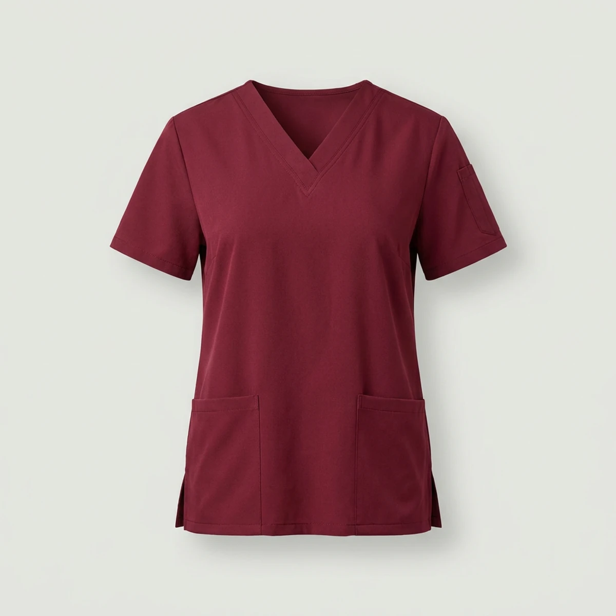 Wine colored V-neck scrub top with sleeve pen pocket and side hem vents