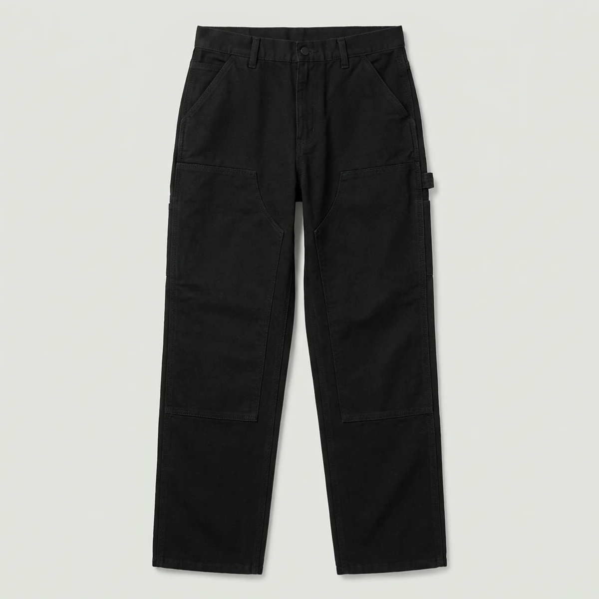 Black canvas carpenter pants with double knees and side rule pocket