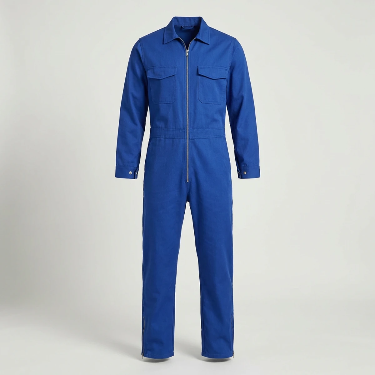 Royal blue work coverall with snap cuffs and leg zippers