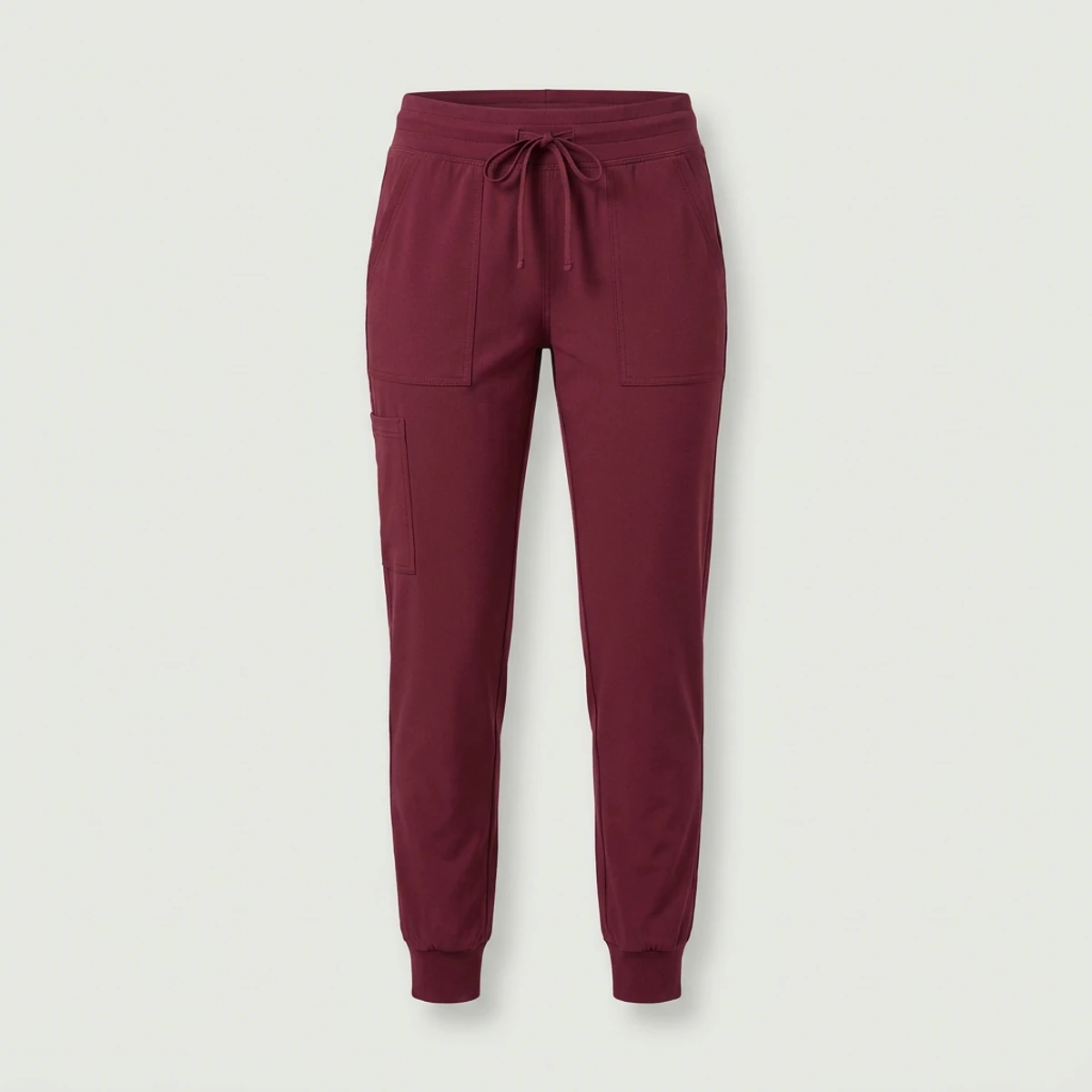 Wine colored women's jogger scrub pants with drawstring and patch pockets