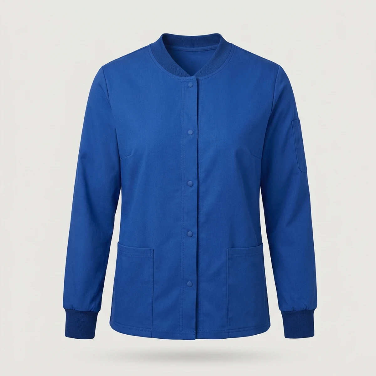 Royal blue snap-front scrub jacket with V-neck rib trim and cuffs