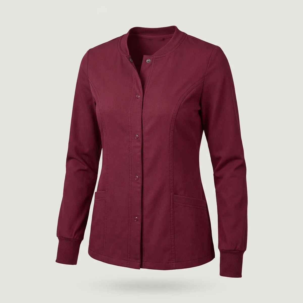Wine colored women's snap-front scrub jacket with princess seams