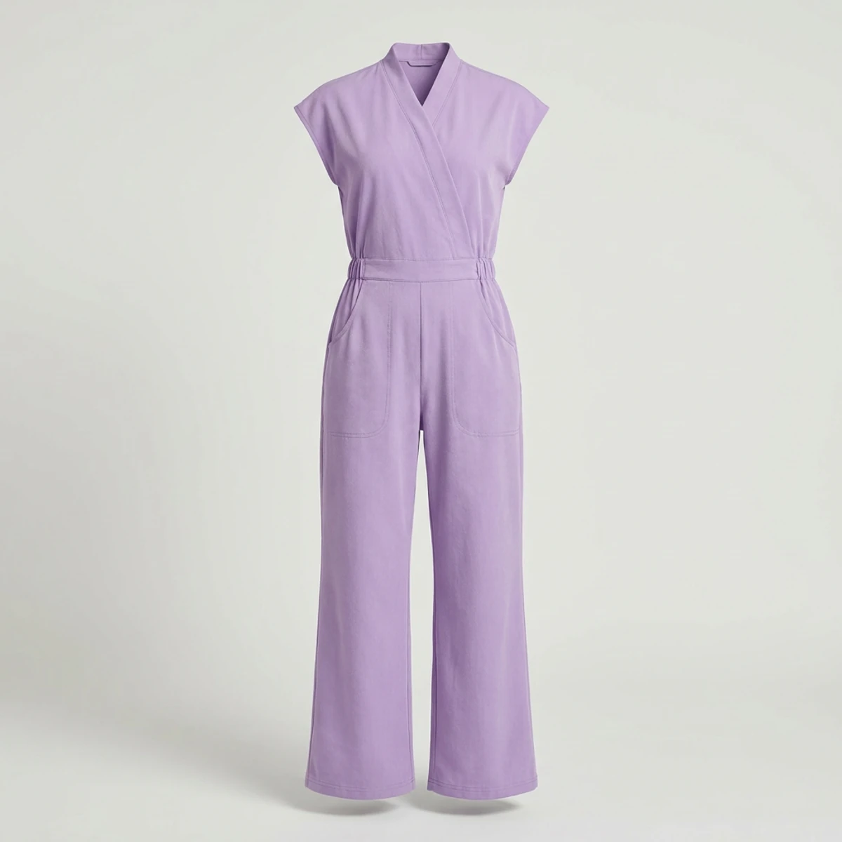 Lavender mock wrap scrub jumpsuit with cap sleeves and wide legs