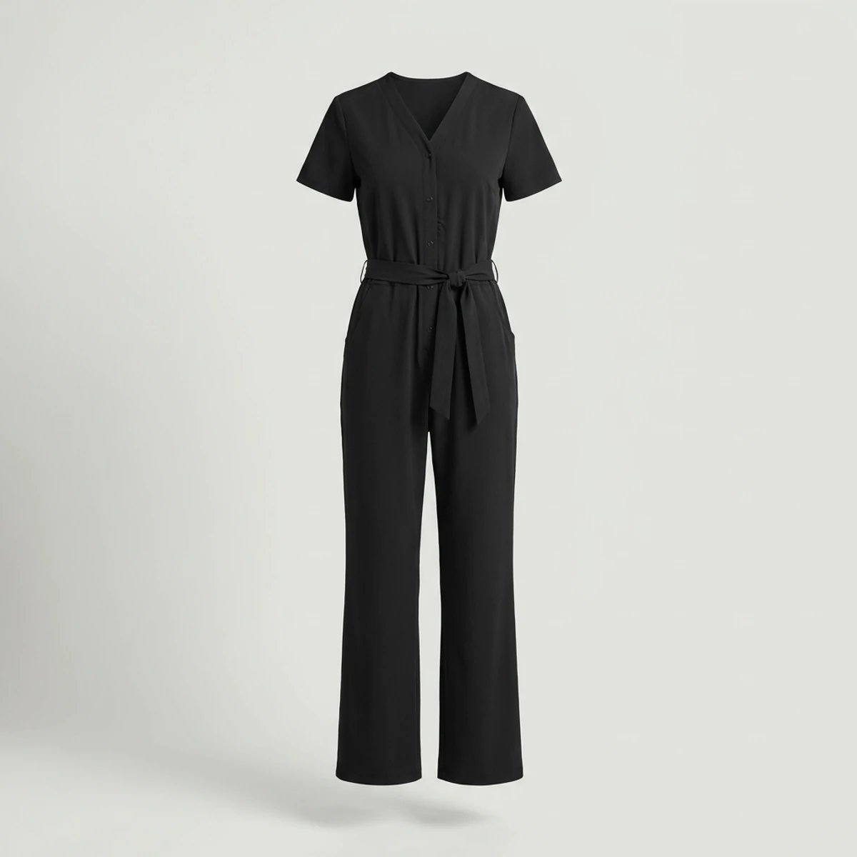 Black women's scrub jumpsuit with tie belt, V-neck and wide legs