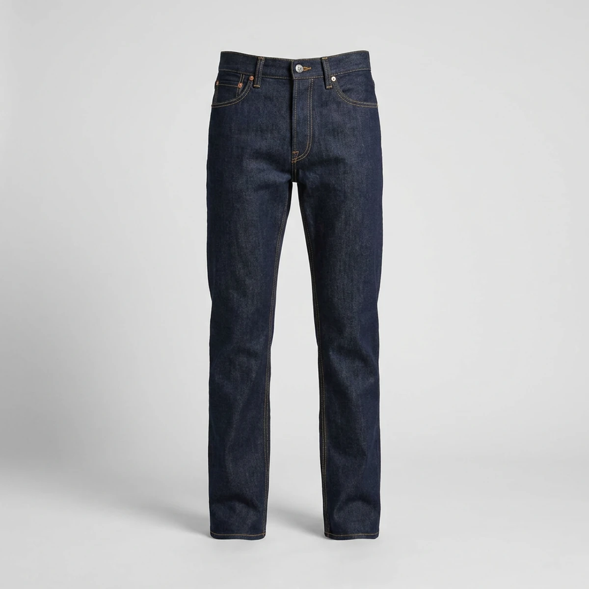 Dark indigo five-pocket work jeans with copper rivets and straight leg